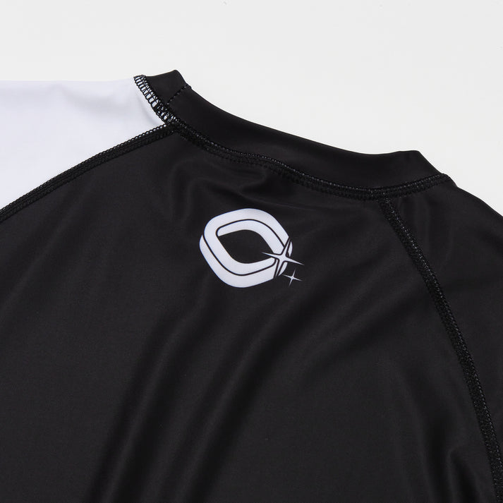 REBELLIOUS BEHAVIOR RBLS SPCS LOGO HALF RASH GUARD (BLACK)