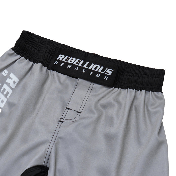 REBELLIOUS BEHAVIOR RBLS SP LOGO FIGHT SHORTS (SILVER)